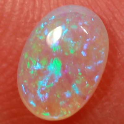 SOLID CRYSTAL OPAL Bright green fire in a 3 dimensional pattern